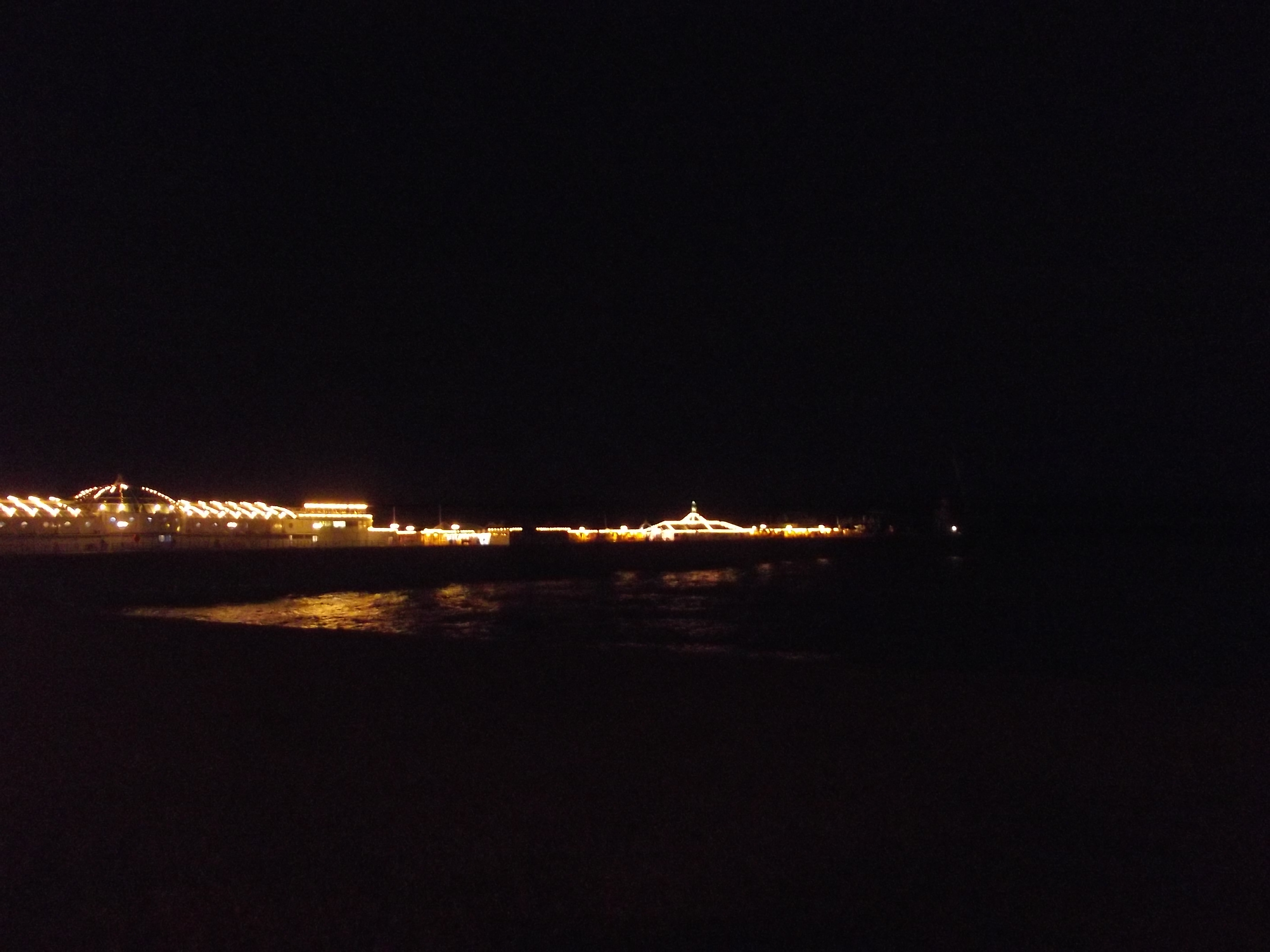 brighton peer at night